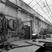 Paisley, MacDowall Street, Caledonia Engineering Works, Interior
View of boiler shop looking SE showing hydraulic beam bending machine