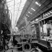 Paisley, MacDowall Street, Caledonia Engineering Works, Interior
View looking S along E wall of boiler shop showing in foreground hydraulic beam bending machine