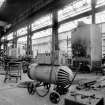 Paisley, MacDowall Street, Caledonia Engineering Works, Interior
View looking NE in main bay of boiler shop showing Lincoln welding machine (type sal 400, 415 volts) with shop air heater in background