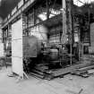 Paisley, MacDowall Street, Caledonia Engineering Works, Interior
View of boiler shop looking SW showing welding machine using headstock of lathe made by G Edwards and Company