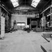 Paisley, MacDowall Street, Caledonia Engineering Works, Interior
View of boiler shop looking N with gas fired heat treatment furnace on right and boom welding machine on left with Butlers 15 ton over-head crane (number 6822, 50' 00'' span) in background