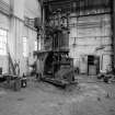 Paisley, MacDowall Street, Caledonia Engineering Works, Interior
View looking SW at S end of boiler shop showing hydraulic flanging machine (made by Fielding and Pratt, Gloucester, England)