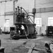 Paisley, MacDowall Street, Caledonia Engineering Works, Interior
View of boiler shop looking SE showing hydraulic flanging machine (made by Fielding and Platt, Gloucester, England)