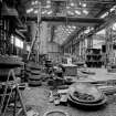 Paisley, MacDowall Street, Caledonia Engineering Works, Interior
View looking N in boiler shop showing hydraulic accumulator and various dies for forming end plates of boilers and company with 15 ton Smith-Keighley over-head crane above