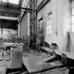 Paisley, MacDowall Street, Caledonia Engineering Works, Interior
View looking E along S wall of boiler shop showing fan (cast-iron body) made by Sturtevant, Boston, Mas., USA, model number 6. Fan for use with curved stove on left (ducting to stoves with ''sluices'')