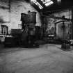 Paisley, MacDowall Street, Caledonia Engineering Works, Interior
View looking NE showing Massey limited hammer with lifting beam (on right E wall of shop)