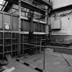 Paisley, MacDowall Street, Caledonia Engineering Works, Interior
View showing rams for lifting access door between textile machine department and machine shop