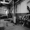 Paisley, MacDowall Street, Caledonia Engineering Works, Interior
View looking S along W wall of department showing 2 ton hand crane for lifting from/into heavy machine shop from textile machine department