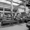 Coatbridge Engine Works, Engineering Shop; Interior
View of varying steadies fitted to Craven No. 146 centre lathe, located at S end of central (No. 1) bay