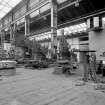 Coatbridge Engine Works, Engineering Shop; Interior
View looking ENE, centre of E (No. 2) bay; left of shot is slotting machine Butler No. 300 (76cm strake). Centre of shot and right of shot are machine Nos 304 and 311 respectively.