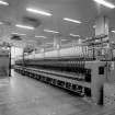 Paisley, Ferguslie Thread Mills, No. 3 Spinning Mill; Interior
View of ring spinning machine in 2nd flat