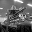 Paisley, Ferguslie Thread Mills, No. 3 Spinning Mill; Interior
View of an 'elephant', a self acting vacuum cleaner which runs above spinning machines in 3rd flat