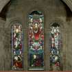 Interior. South chapel, stained glass window showing Christ with Moses and Elijah, the Transfiguration.