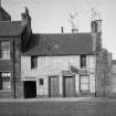 Newhaven, 38-39 Main Street.
View of South elevation, showing entry to former Parliament Square.
Painted sign, 'The Auld Haven'.