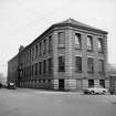 Glasgow, 14 St Marnock Street, Crownpoint Carpet Works
View from W showing NNW and WSW fronts of office and preparation block
