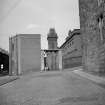 Glasgow, Edington Street, Port Dundas Power Station
View from S showing entrance gate on Corn Street with power station in background