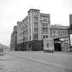 Glasgow, 124-36 Cheapside Street, Cold Store
View from SE showing Anderston Quay frontage, Harland and Wolff Diesel Engine Works in background