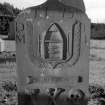 Kirkton of Mailer.
Gravestone commemorating Margaret Imbrie, d.1775. Boat containing two fish; intials D T and M I; 'MOMENTO MORI' scroll, hourglass, crossbones and skull.