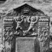 Perth, Greyfriars Burial Ground.
View of the gravestone of the Austine Children, 1701. A pointed-top stone with central crown and the date '1701' carved above two putti with trumpets standing on an hourglass, skull and bone, (signifying triumph over death). The inscription panel is framed by herms inscribed with 'Mememto Mori'.
Insc: 'Here Lys Five Children Belonging To William Austine Merchant In Perth And To Bettine Carner His Spouse'.