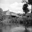 Riccarton Mill
View from W showing part of SW front of mill with cottages on right