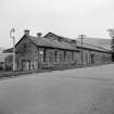 Newtyle, Old Station
View from WNW showing NW and SW fronts of offices with train shed in background