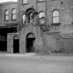 Paisley, Renfrew Road, Vulcan Works
View from W showing WNW front of doorway which is surmounted by a bellcote
