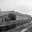 Cupar, Station Road, Linen Mill
View from N showing WNW front of weaving sheds with preparation buildings in background