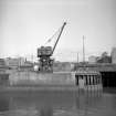 Glasgow, Kingston Dock
View of travelling crane at W side of dock entrance, from SE