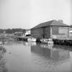 Kingholm Quay
View from WSW showing NW and SW fronts of N warehouse with basin in foreground