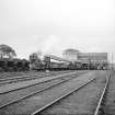 Waterside Colliery, Coal Washery
View from W showing WNW front of washery with trains and trucks in foreground