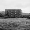 Glasgow, 67 Royston Road, Cotton Spinning Mill
View from NNW showing NNW front of mill with brick sheds in foreground