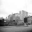 Glasgow, 100 Duke Street, Cotton Mill
View from SE showing ESE front and part of SSW front of Cotton Mill with 48 Simpson Heights in background and part of SSE front of numbers 111-123 on the right