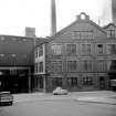 Glasgow, 136 St James Street, Herriot Hill Stationery and Printing Works
View of buildings on corner of St James Road and Taylor Street, from N