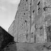 New Lanark
View of rear of Mill No. 3 (foreground) and Mill No. 2 (background), from SE; note wheel arch in foreground
