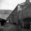 New Lanark, Engineer's Shop
View along W frontage, from S