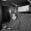Kilmarnock, Kilmarnock Works, Interior
View showing man sitting in chair of CR coach