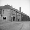 Bo'ness, Links Road, New Grange Foundry
View from E showing NNE front and part of ESE front of E blocks