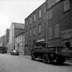 Edinburgh, 18-19 Mitchell Street, Warehouse
View from SE showing SSW front of numbers 18-19 with number 17 in background and part of numbers 20-28 in foreground