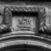 Edinburgh, 12-14 John's Place.
Detail of crest and rope moulding above entrance to warehouse in South-West wall.