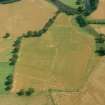 Strageath, oblique aerial view, taken from the W, centred on cropmarks of the Roman Fort and Annexe.