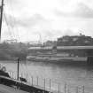 View from NW showing Queen Mary II at Bridge Wharf with part of George the Fifth Bridge on left