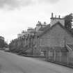 View from SSE showing SW and SE fronts of houses on N side of Teith Road