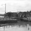View from E showing ENE front of Bascule Bridge with warehouses in background