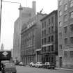 View from NNE showing ESE front of Washington Flour Mills with 84 Washington Street and part of Crown Flour Mills in foreground