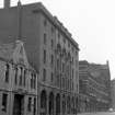 View from S showing ESE front of store with Globe Tubes Works in foreground and foundry and engine works in background