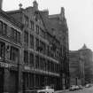 View from S showing ESE front of saw mill with warehouse in background