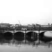 View from E showing part of ESE front of Glasgow Bridge with railway bridge in background