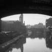 View looking S along White Cart Water showing bridge in distance