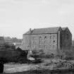 View from E showing NNE and ESE fronts of E block and ESE front of kiln