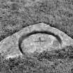 Stone bearing incised cross within a large circle.
Original negative captioned: 'Sculptured Stone at Dunecht House Feb 1914'.
